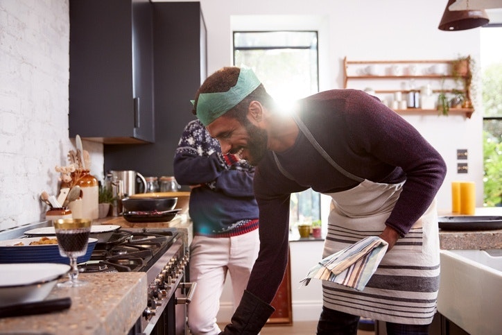 Couple cooking in the kitchen at Christmas.jpg